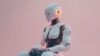 ai humanoid robot sitting waiting in a pink room